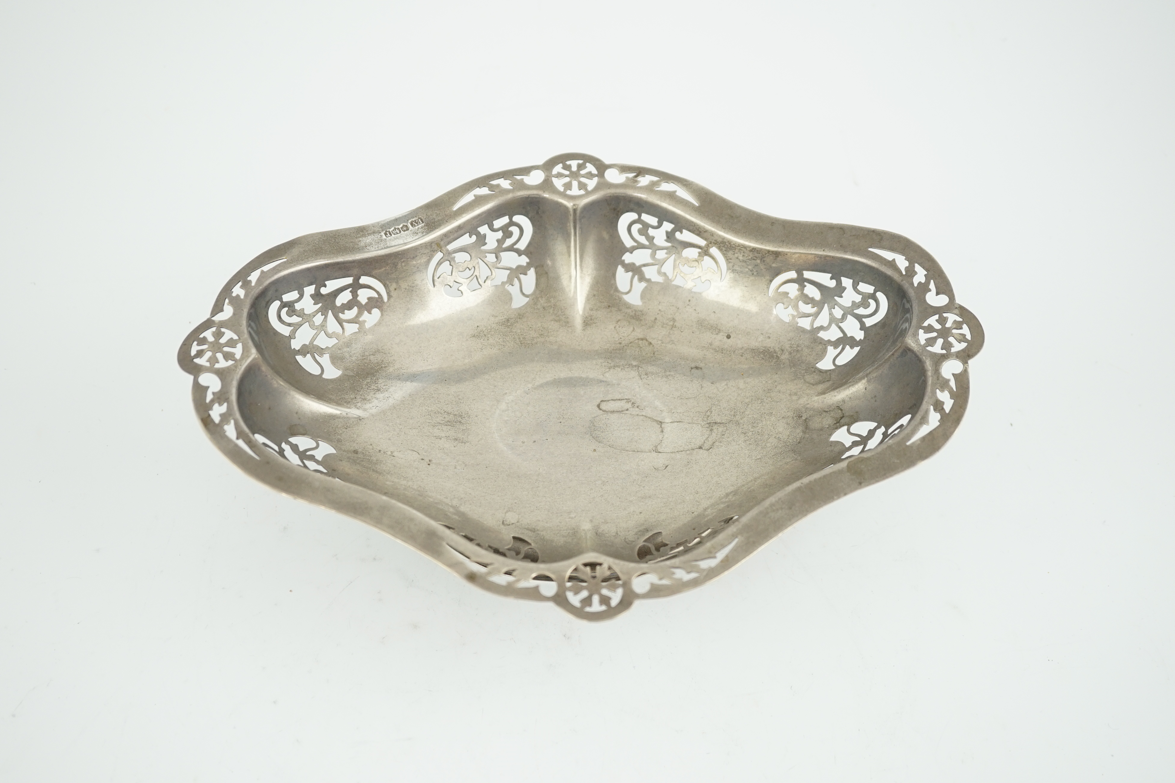 A George V pierced silver oval fruit dish, by Viners Ltd